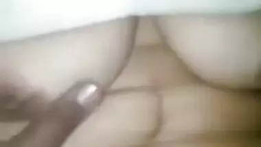 Desi female pulls pink T-shirt up revealing natural XXX boobs for man