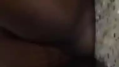 Slinky Desi slut takes her XXX coconuts out and licks sex nipple