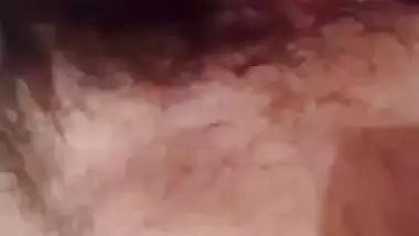 Indian girl nude MMS of a girl fingering her hairy pussy